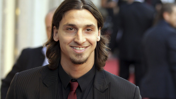 AC Milan forward Zlatan Ibrahimovic, of Sweden, arrives on the red carpet to attend the presentation of a portraits book ' Milan Fashion , soccer players portraits' sponsorized by Dolce & Gabbana fashion brand , in downtown Milan, Italy, Thursday, May 19,