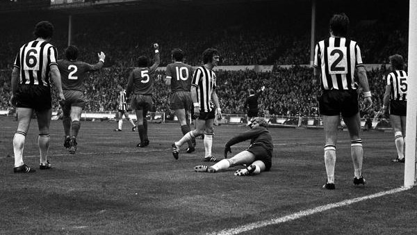 Dejection for Newcastle United's Alan Shearer (standing) and David Batty after Newcastle were defeated 2-0 by Arsenal in the FA Cup Final at Wembley this afternoon (Saturday). Photo by Owen Humphreys/PA
