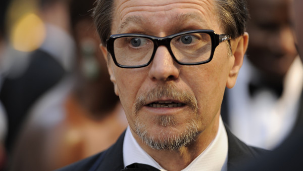 Gary Oldman arrives before the 84th Academy Awards on Sunday, Feb. 26, 2012, in the Hollywood section of Los Angeles. (AP Photo/Chris Pizzello)