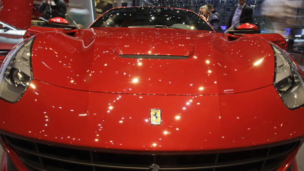 Cristiano Ronaldo's Ferrari is lifted onto a truck after it was crashed on the A538 near Wilmslow, Cheshire.