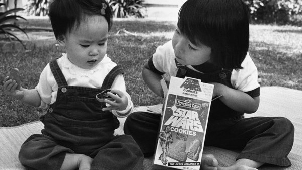 Three Year Old Michael Huynh, right,and his sister Bettina, sample a Darth Vader Cookie June 26,1983 in Los Angeles. Darth Vader Cookie is one of the many and varied 