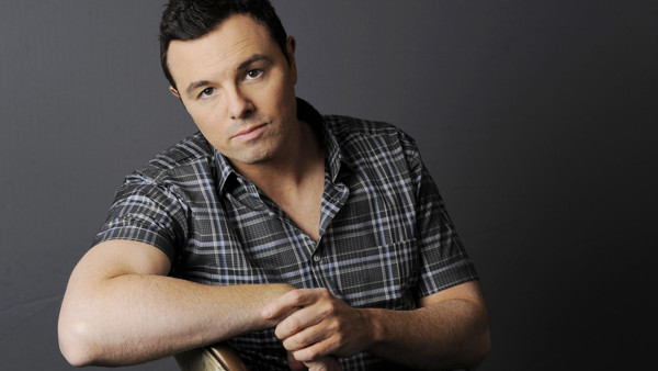 FILE - This June 16, 2012 photo shows Seth MacFarlane posing for a portrait at The Four Seasons Hotel in Beverly Hills, Calif. Early reviews for Seth MacFarlane's Oscar-hosting skills are very positive. The Academy Awards won't be presented until Sunday, 