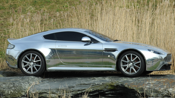 An mirror finish Aston Martin sits outside the headquarters in Gaydon, Warwickshire.