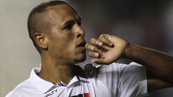 Brazil's Sao Paulo FC' Luis Fabiano celebrates after scoring against Bolivia's The Strongest during a Copa Libertadores soccer match in Sao Paulo, Brazil, Thursday, Feb. 28, 2013. (AP Photo/Andre Penner)