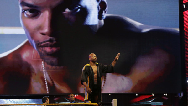 Professional wrestler Percy Watson waves to the crowd before his wrestling match against Mason Ryan at Wrestlemania Axxess event Saturday, April 6, 2013, in East Rutherford, N.J., ahead of Sunday's WWE Wrestlemania 29 wrestling event at MetLife stadium. (