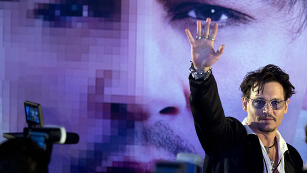 FILE - In this Monday, March 31, 2014 file photo, actor Johnny Depp attends a promotional event for his new movie Transcendence in Beijing, China. The film releases in the US on April 18, 2014. (AP Photo/Alexander F. Yuan)