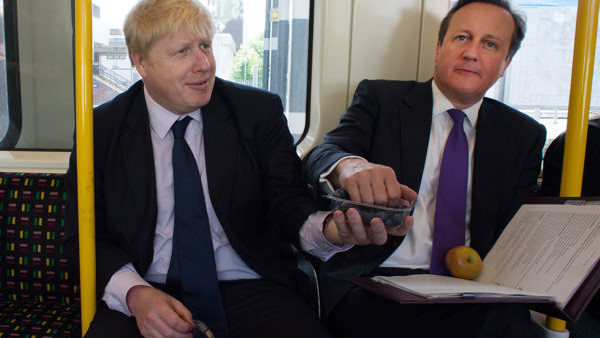 The Prince of Wales and the Duchess of Cornwall behind the bar during their visit to 'The Bell' in Purleigh, Essex where they also viewed some of the local produce grown by residents, before learning more about the arts and craft activities which 