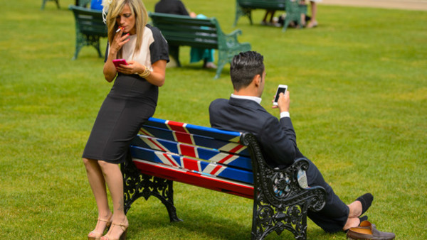 The Prince of Wales and the Duchess of Cornwall behind the bar during their visit to 'The Bell' in Purleigh, Essex where they also viewed some of the local produce grown by residents, before learning more about the arts and craft activities which 