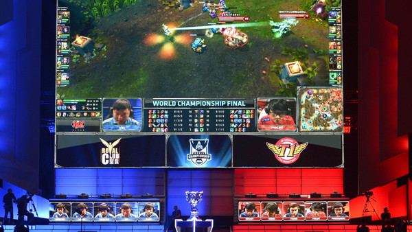 FILE - In this Oct. 4, 2013, file photo, the teams of China's Royal Club, left, and South Korea's SK Telecom T1 compete at the League of Legends Season 3 World Championship Final in Los Angeles. Robert Morris University Illinois, a small private universit