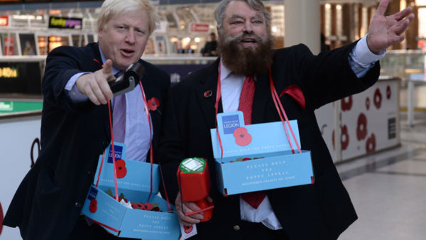 The Prince of Wales and the Duchess of Cornwall behind the bar during their visit to 'The Bell' in Purleigh, Essex where they also viewed some of the local produce grown by residents, before learning more about the arts and craft activities which 