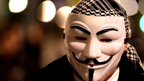 Members of activist group Anonymous during a protest in Parliament Square, central London.