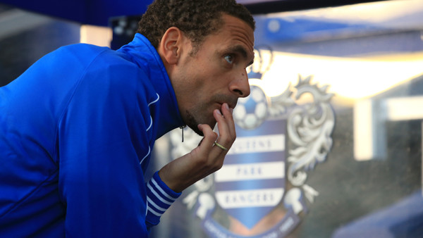 Queens Park Rangers' Rio Ferdinand in the dugout before the Barclays Premier League match at Loftus Road, London.