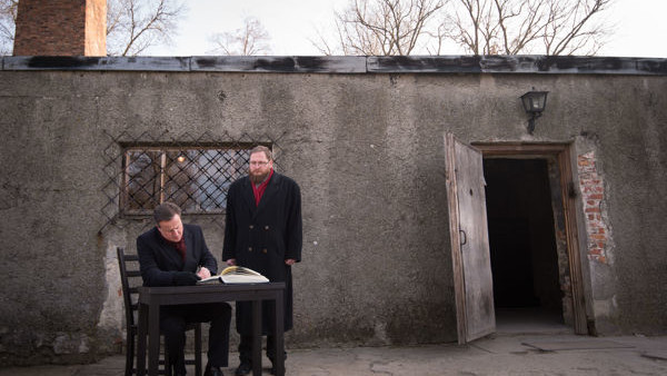 REVIEW OF THE YEAR PICS 2014 File photo dated 10/12/14 of Prime Minister David Cameron signing the guest book outside a gas chamber at the Auschwitz concentration camp in Poland.