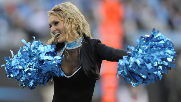 A Carolina Panthers cheerleader performs in the second half of an NFL football game against the Tampa Bay Buccaneers in Charlotte, N.C., Sunday, Dec. 14, 2014. The Panthers won 19-17. (AP Photo/Mike McCarn)