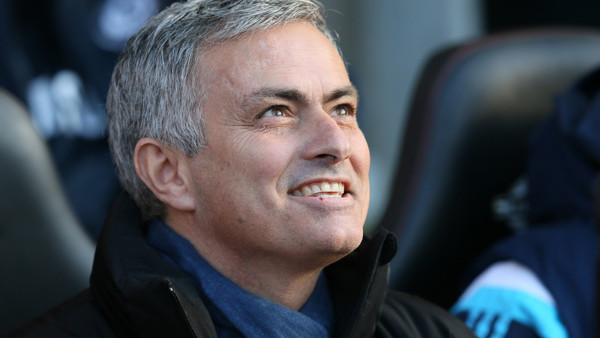 Chelsea Manager Jose Mourinho smiles before the English Premier League soccer match between Southampton and Chelsea at St Mary's Stadium, Southampton, England, Sunday, Dec. 28, 2014. (AP Photo/Tim Ireland)