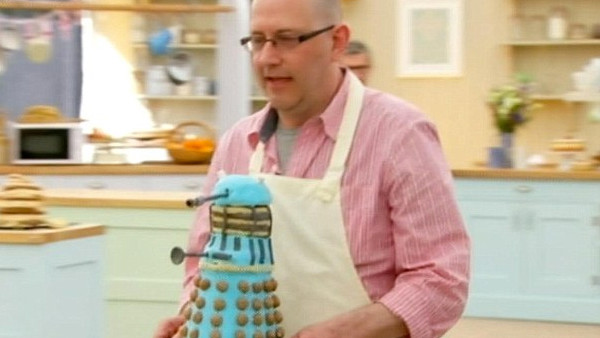 The Prince of Wales and the Duchess of Cornwall behind the bar during their visit to 'The Bell' in Purleigh, Essex where they also viewed some of the local produce grown by residents, before learning more about the arts and craft activities which 