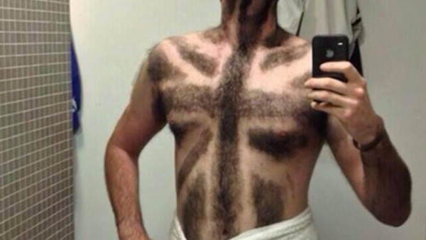 The Prince of Wales and the Duchess of Cornwall behind the bar during their visit to 'The Bell' in Purleigh, Essex where they also viewed some of the local produce grown by residents, before learning more about the arts and craft activities which 