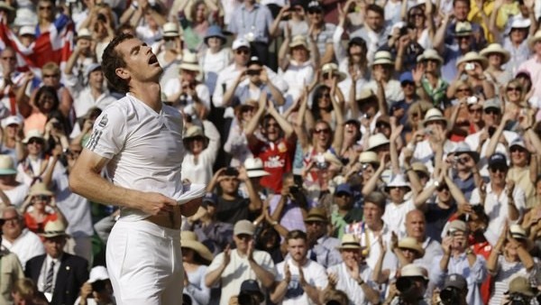 Andy Murray of Britain reacts as he wins against Novak Djokovic of Serbia during the Men's singles final match at the All England Lawn Tennis Championships in Wimbledon, London, Sunday, July 7, 2013. (AP Photo/Anja Niedringhaus, Pool)