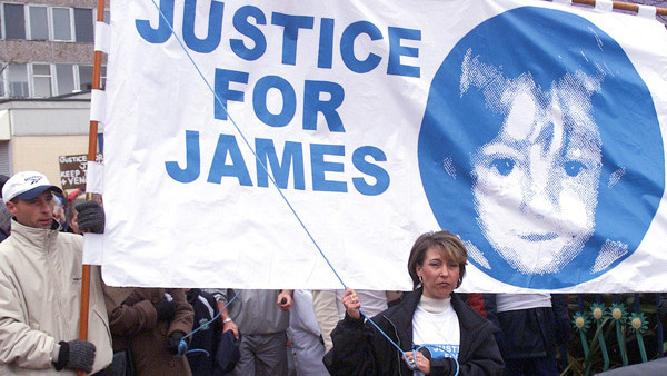 Denise Fergus, 33, centre, the mother of the murdered little boy James Bulger leading a march of more than 300 people in protest at the expected release of his killers. She led the procession through the streets of her home town in Kirkby, Merseyside * .