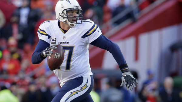 New England Patriots quarterback Tom Brady, left, celebrates with head coach Bill Belichick after defeating the Miami Dolphins 41-13 in an NFL football game Sunday, Dec. 14, 2014, in Foxborough, Mass. (AP Photo/Charles Krupa)