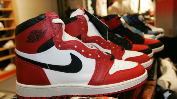 In a wide array of colors, the original models of the shoe that Michael Jordan wore in in the NBA in 1985 sit in a row at a shoe collectors' show at Niketown in Denver on Friday, Feb. 18, 2005. (AP Photo/David Zalubowski)