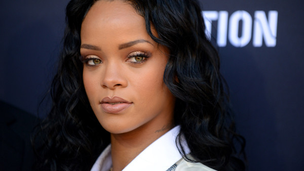 FILE - In a Saturday, Jan. 25, 2014 file photo, Rihanna arrives at the Roc Nation 2014 Pre-Grammy Brunch Celebration, in Los Angeles. Madonna, Rihanna and Sam Smith will perform at the second annual iHeartRadio Music Awards on March 29, 2015, at the Shrin