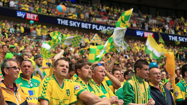 Norwich City supporters in the stands during the game.