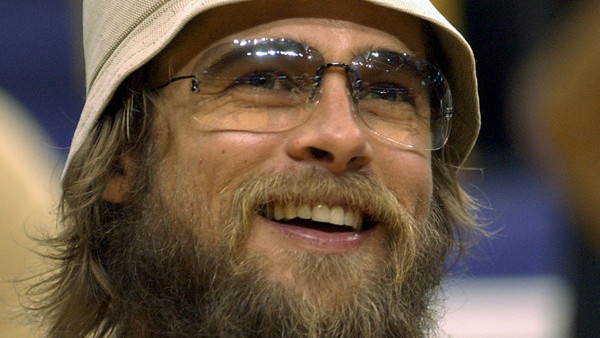 Actor Brad Pitt watches from courtside as the Los Angeles Lakers prepare to face the Sacramento Kings in Game 3 of the Western Conference finals.