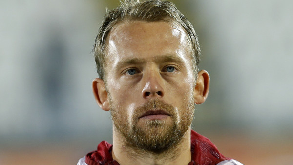 Denmarks Michael Krohn-Dehli prior to playing their Euro 2016 Group I qualifying match between Serbia and Denmark, at the Partizan stadium in Belgrade, Serbia, Friday, Nov. 14, 2014. (AP Photo/Darko Vojinovic)