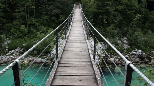 In this photo taken Tuesday, Jan. 27, 2015, shows Lake Bled in Slovenia with a island and the Church of Our Lady on it. Tucked in the southwestern corner of Slovenia, between Austria and Italy, stands a spectacular landscape: a lush tiny island in the mid