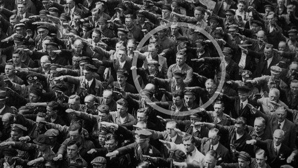 August Landmesser, refuses to give the Nazi salute