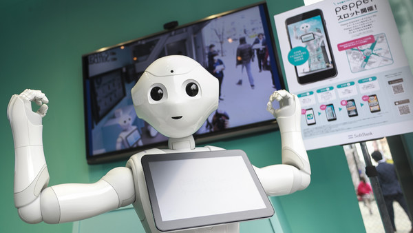 Robots on hand to serve you at Tokyo phone store
