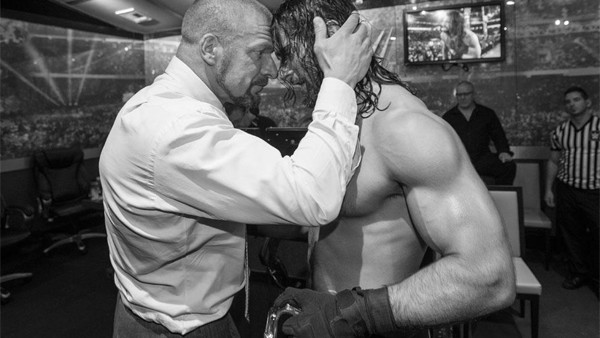 Rollins Triple H Kiss