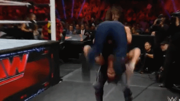 Rollins Powerbomb Dean Into Barricade