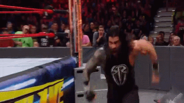 Braun Strowman Powerslam Roman Reigns Table Fastlane
