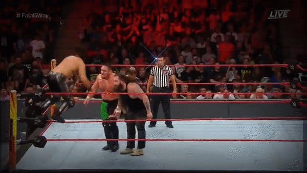 Seth Rollins Diving Crossbody Cage Rusev Kevin Owens