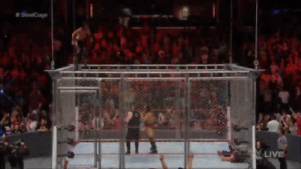 Seth Rollins Diving Crossbody Cage Rusev Kevin Owens