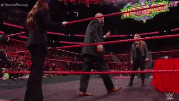 Ronda Rousey Triple H Belly To Belly Suplex Table