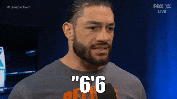 Roman Reigns Baron Corbin