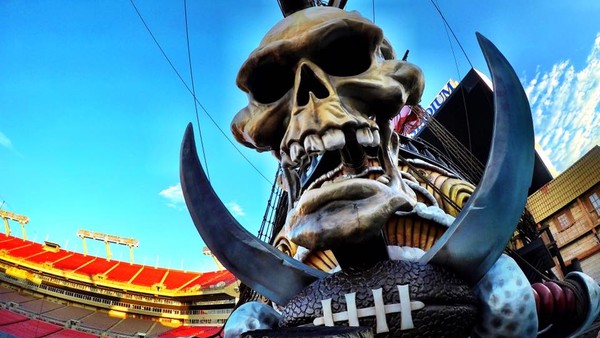 New England Patriots quarterback Tom Brady, left, celebrates with head coach Bill Belichick after defeating the Miami Dolphins 41-13 in an NFL football game Sunday, Dec. 14, 2014, in Foxborough, Mass. (AP Photo/Charles Krupa)
