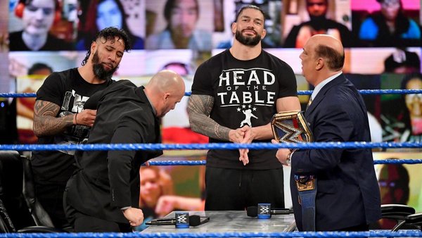 Roman Reigns Paul Heyman Jey Uso Adam Pearce