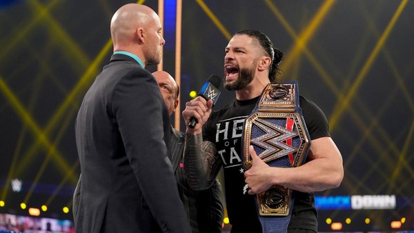 Roman Reigns Paul Heyman Adam Pearce