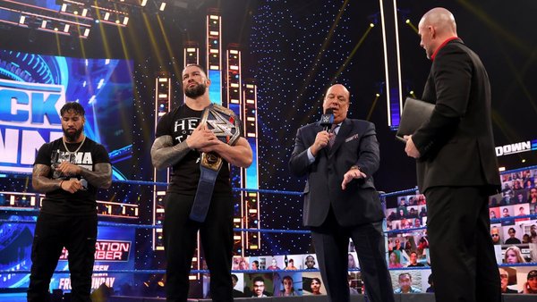 Paul Heyman Roman Reigns Jey Uso Adam Pearce
