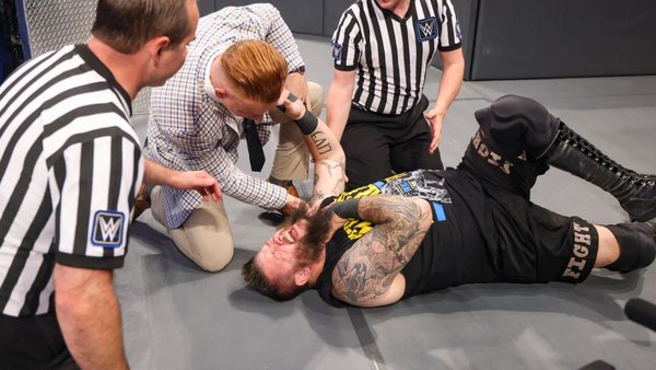 Kevin Owens Commander Azeez Apollo Crews
