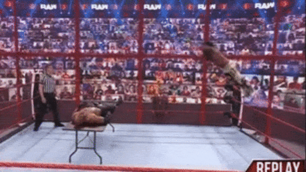 Xavier Woods Bobby Lashley Elbow Drop