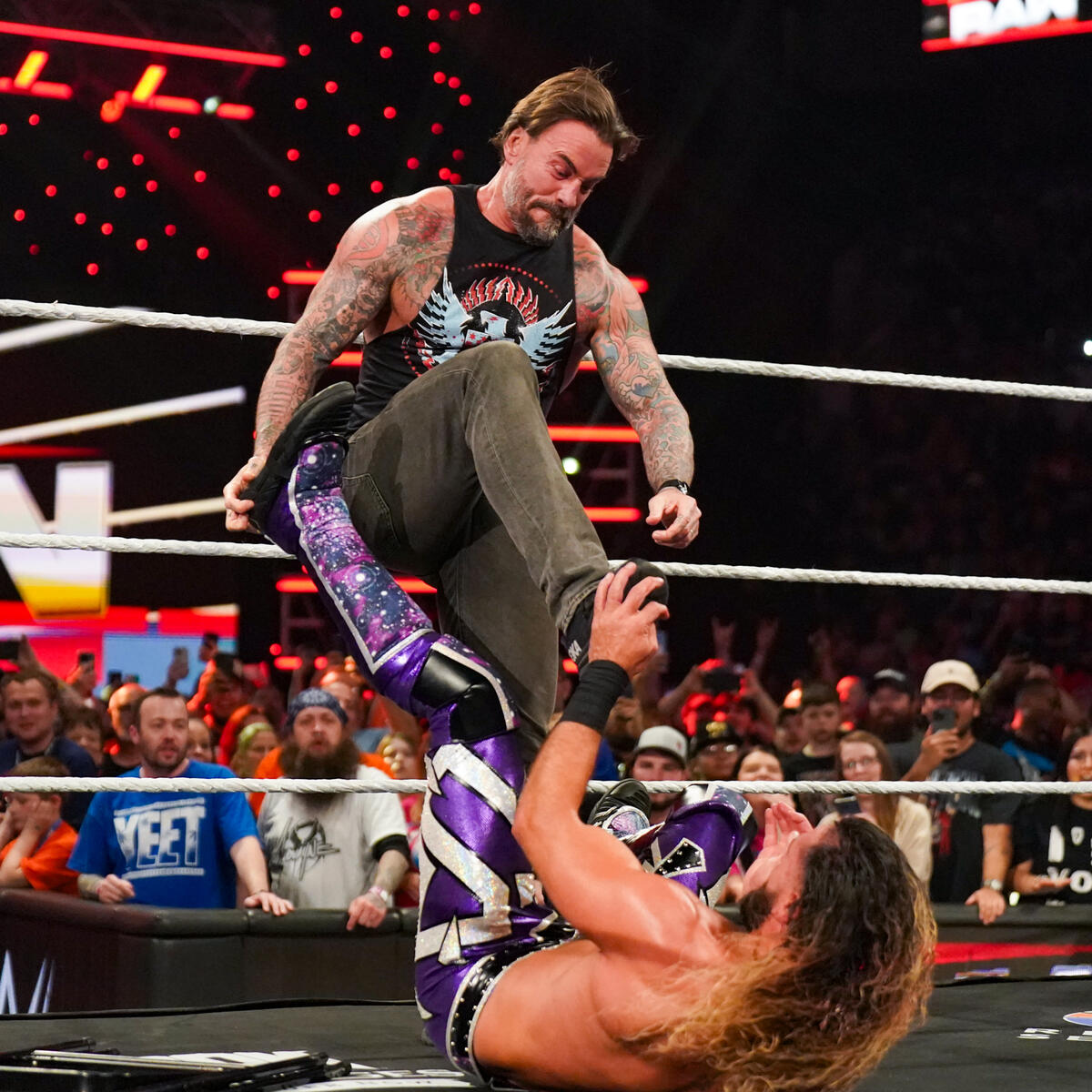 CM Punk Seth Rollins