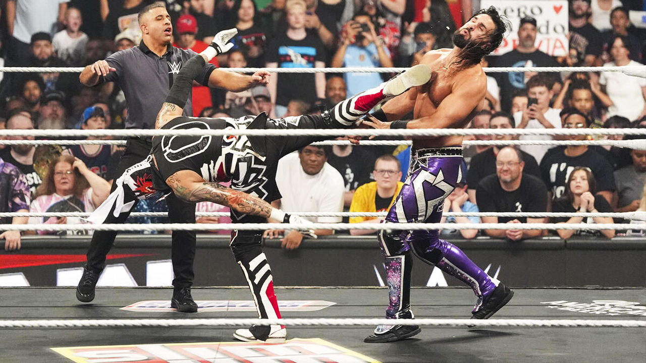 WWE Raw Penta Seth Rollins