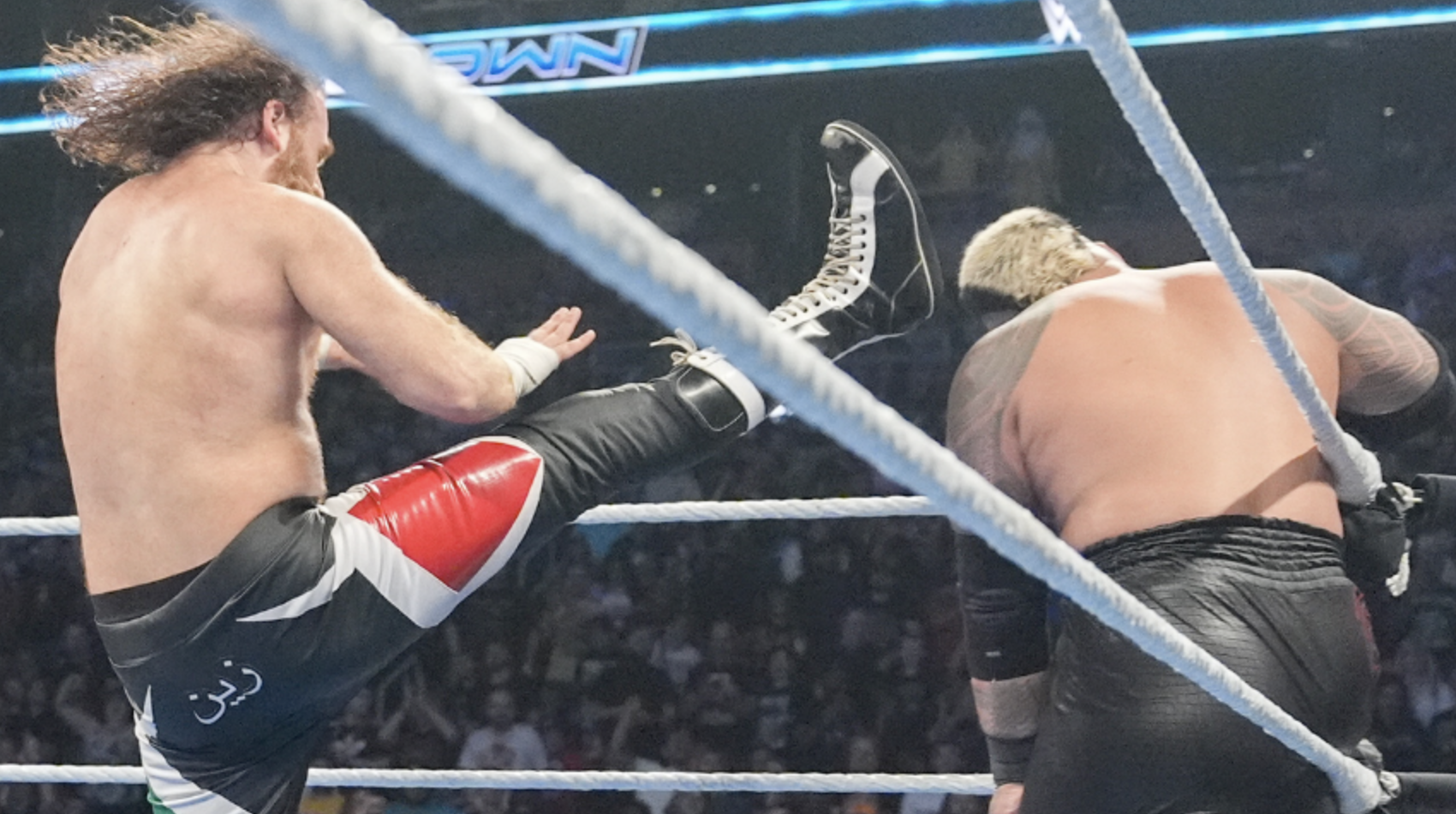 Sami Zayn Solo Sikoa Helluva Kick