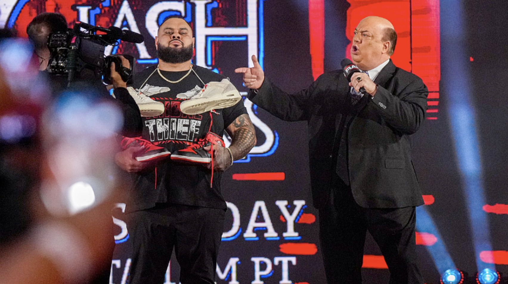 Bronson Reed Paul Heyman Roman Reigns Shoes