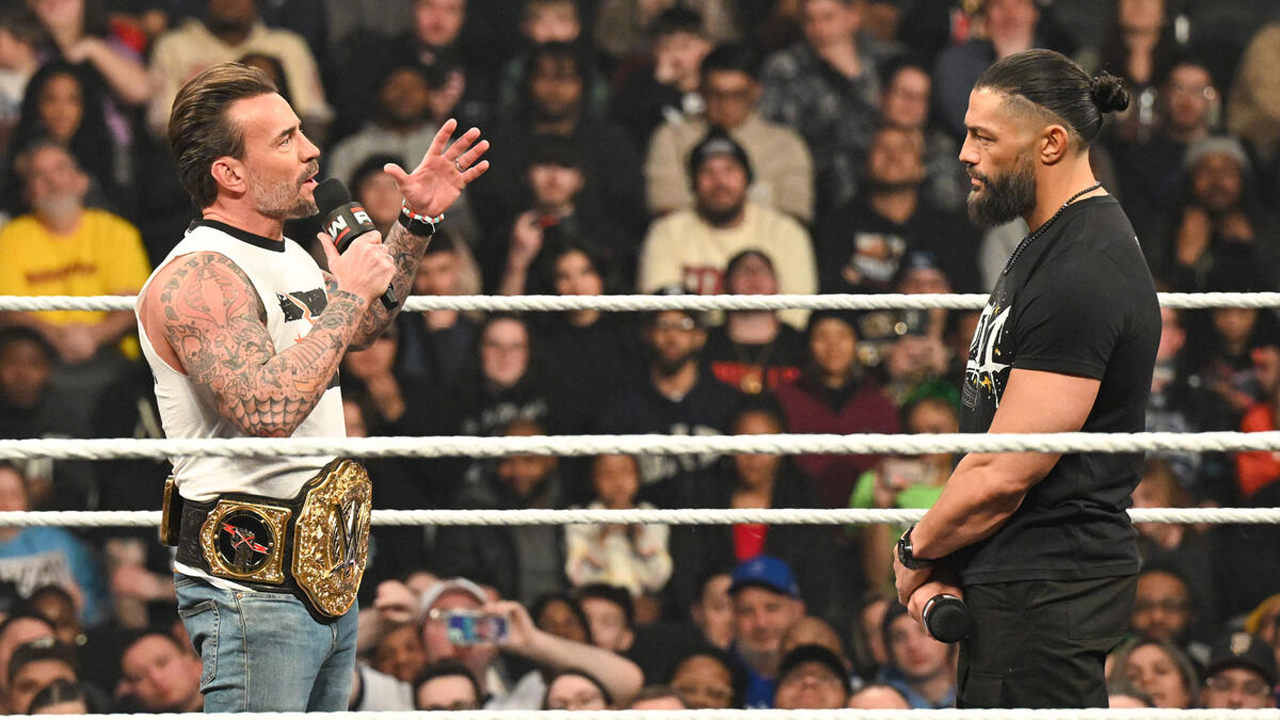 WWE Raw CM Punk Roman Reigns
